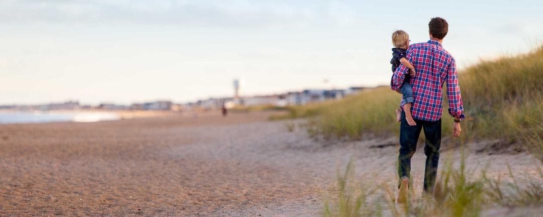 A stylish desk with a laptop, notebook, and coffee, suggesting a blog or writing theme.